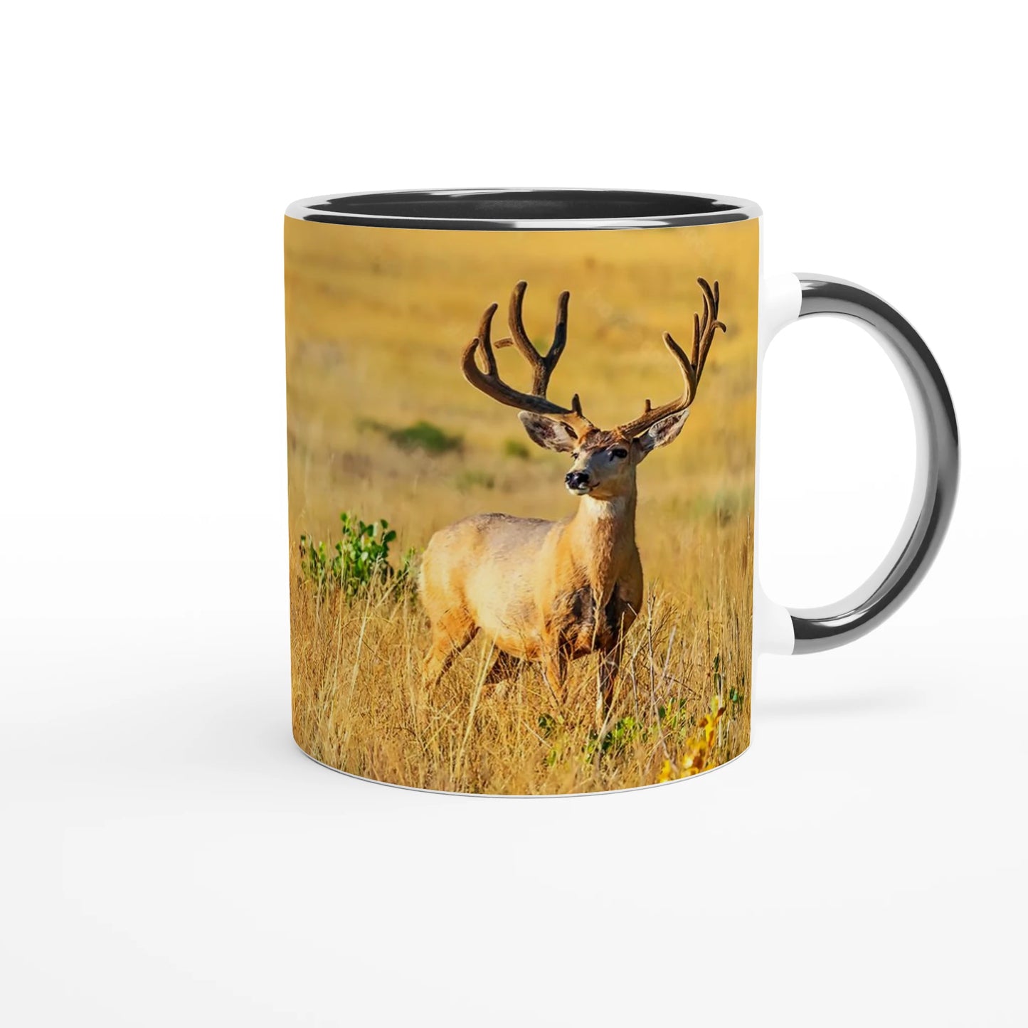 mule deer standing in grass on a coffee mug
