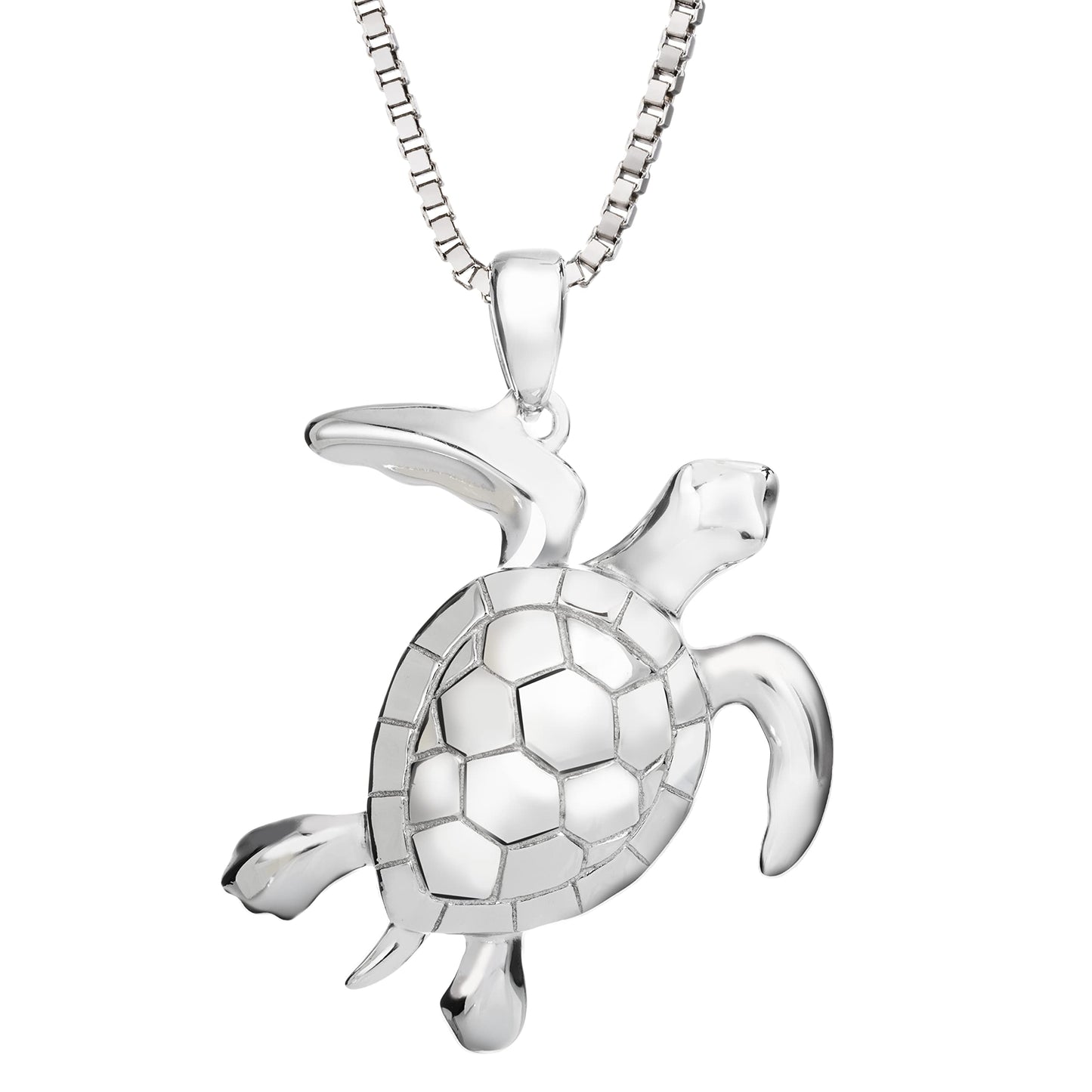 silver sea turtle pendant on a box chain against a white background