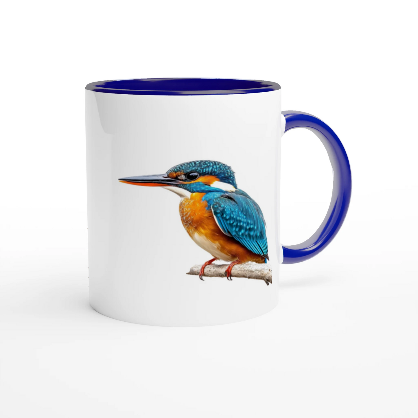 kingfisher in vibrant colours perched on a branch on awhite coffee mug