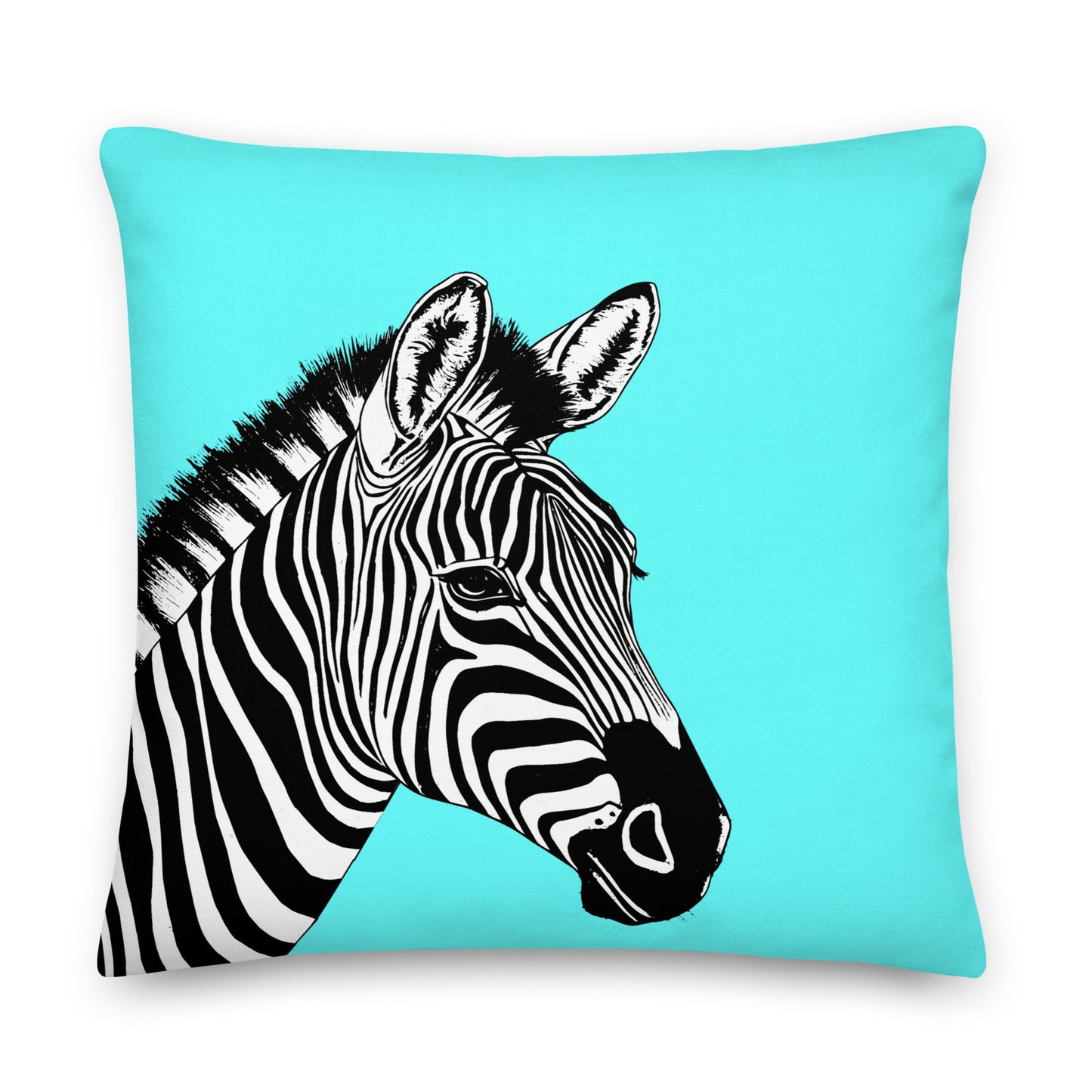 black and white zebra head on a turquoise cushion
