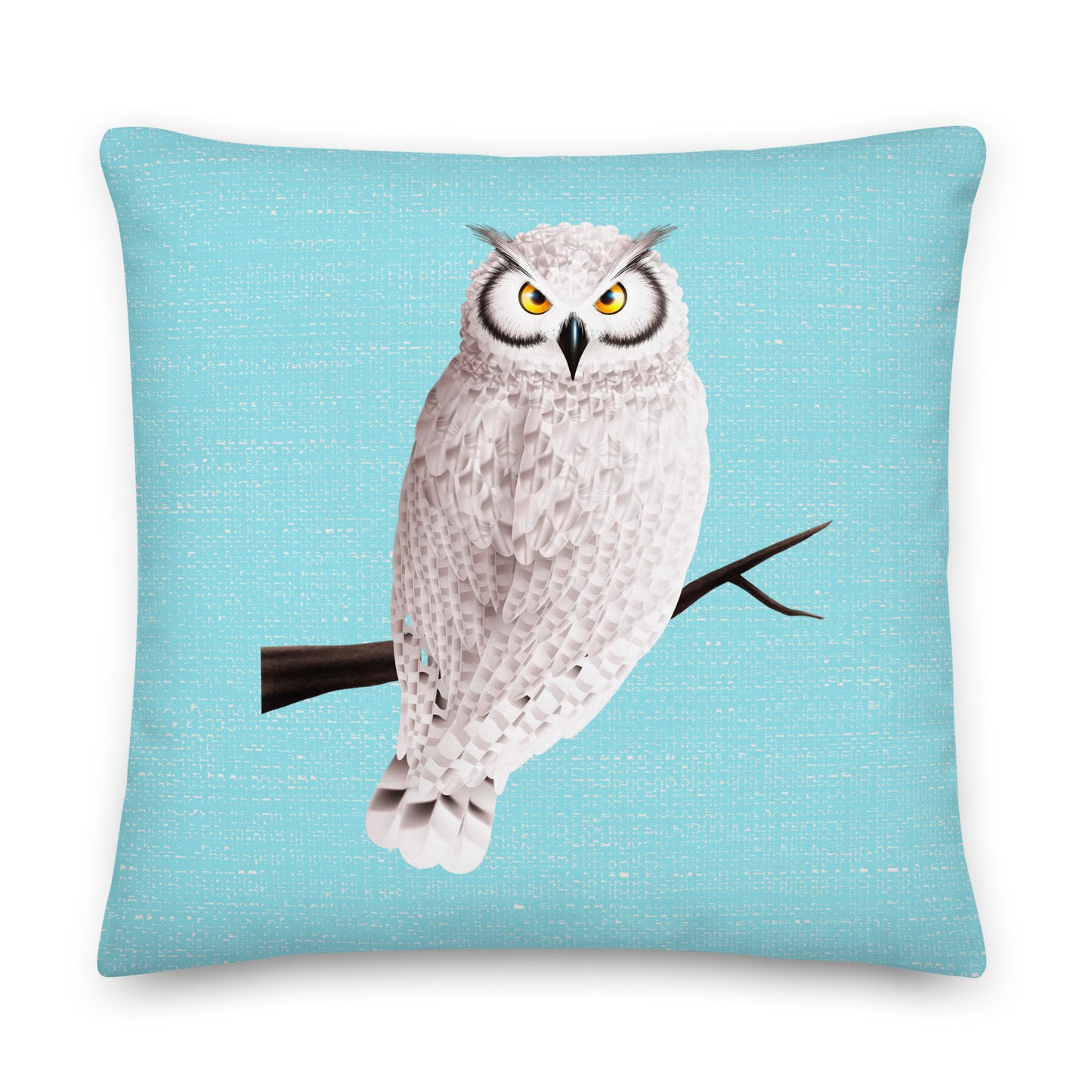 grey and white owl design on a blue cushion