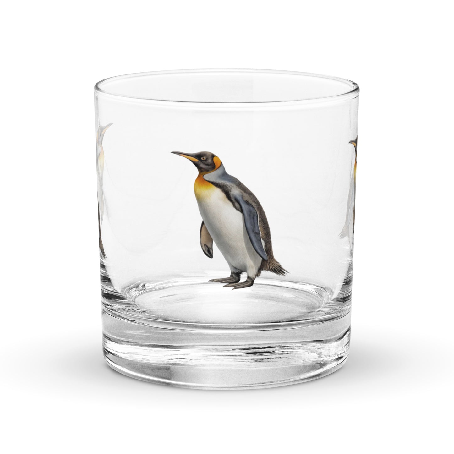 king penguin design on a glass whisky tumbler