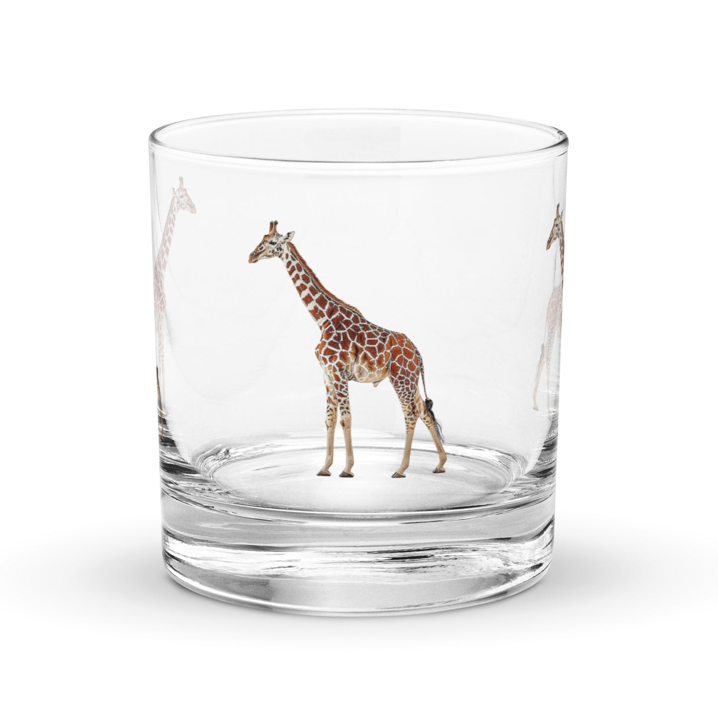glass whisky tumbler with a giraffe image on a white background