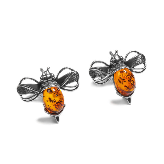bumble bee design stud earings in silver and amber on a white background