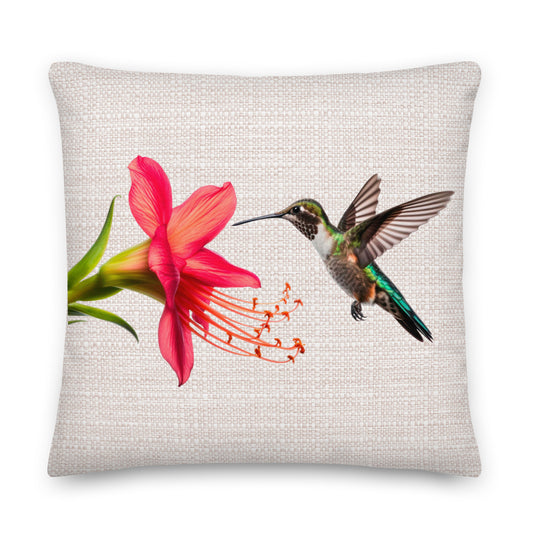 hummingbird and red flower on a grey cushion