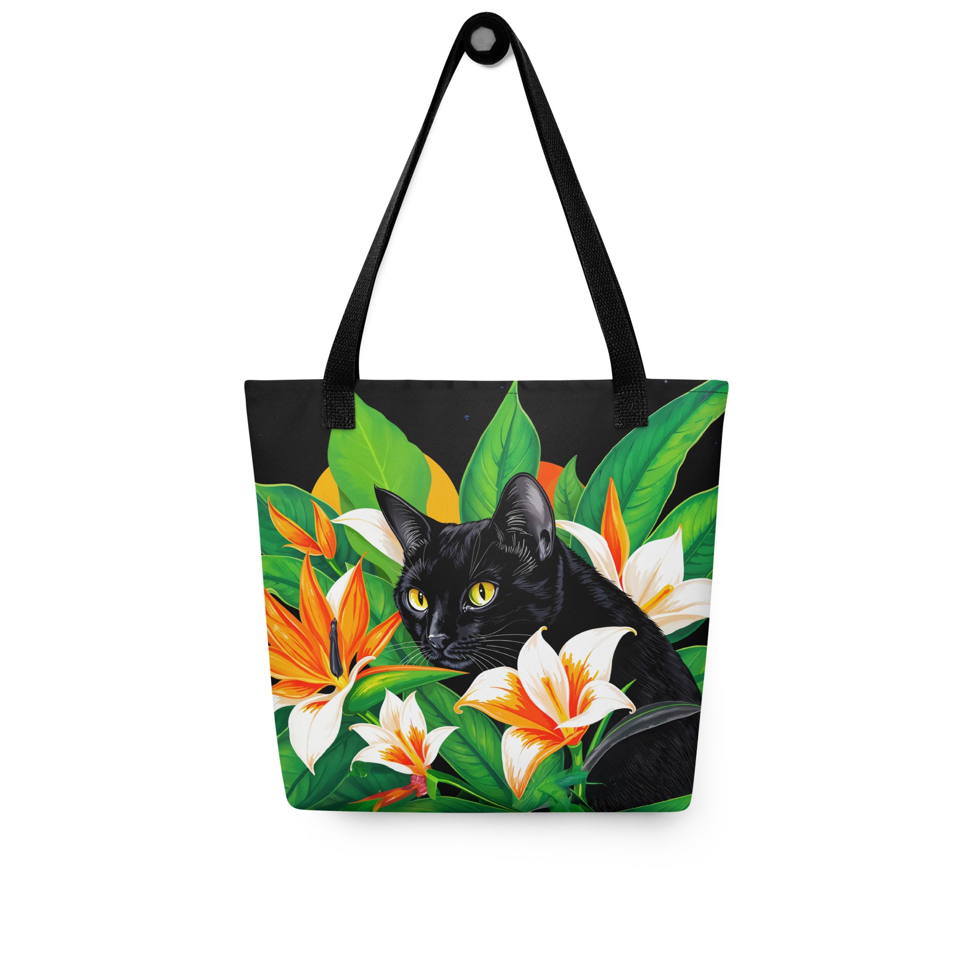 Tote bag with a black cat and tropical flowers design on a white background