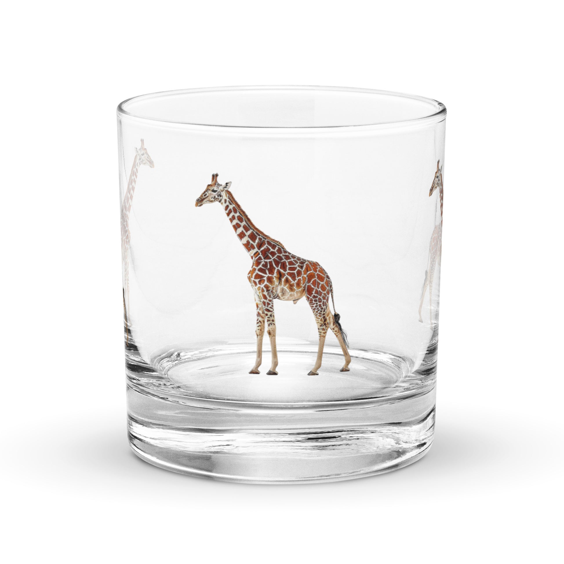 glass whisky tumbler with a giraffe image on a white background