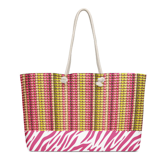 weekender tote bag printed with stripes and a pink zebra skin design